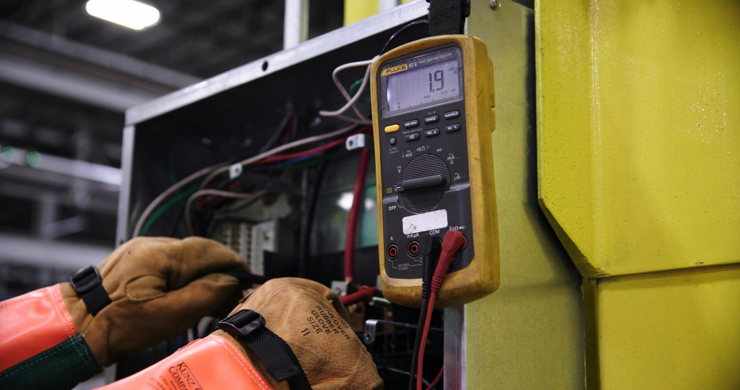 Solar panel maintenance in Alton Storage battery inspections Man inspecting storage batteries