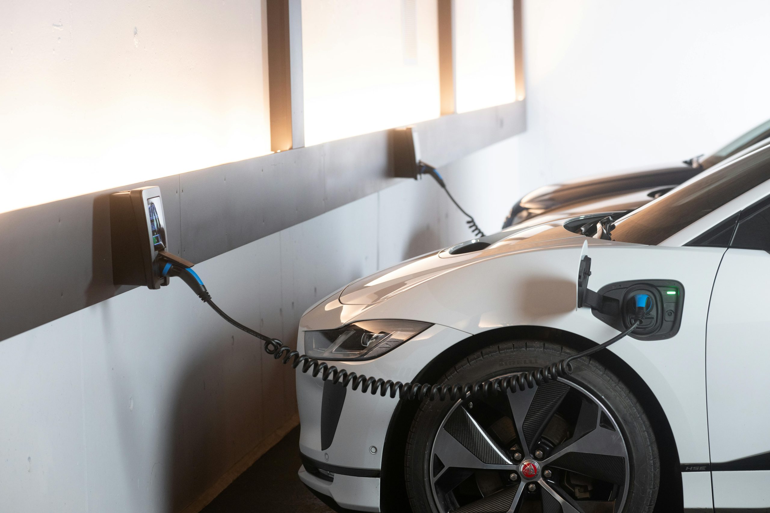 EV charging set up wall mounted ev charger Solar panel installation in Guildford